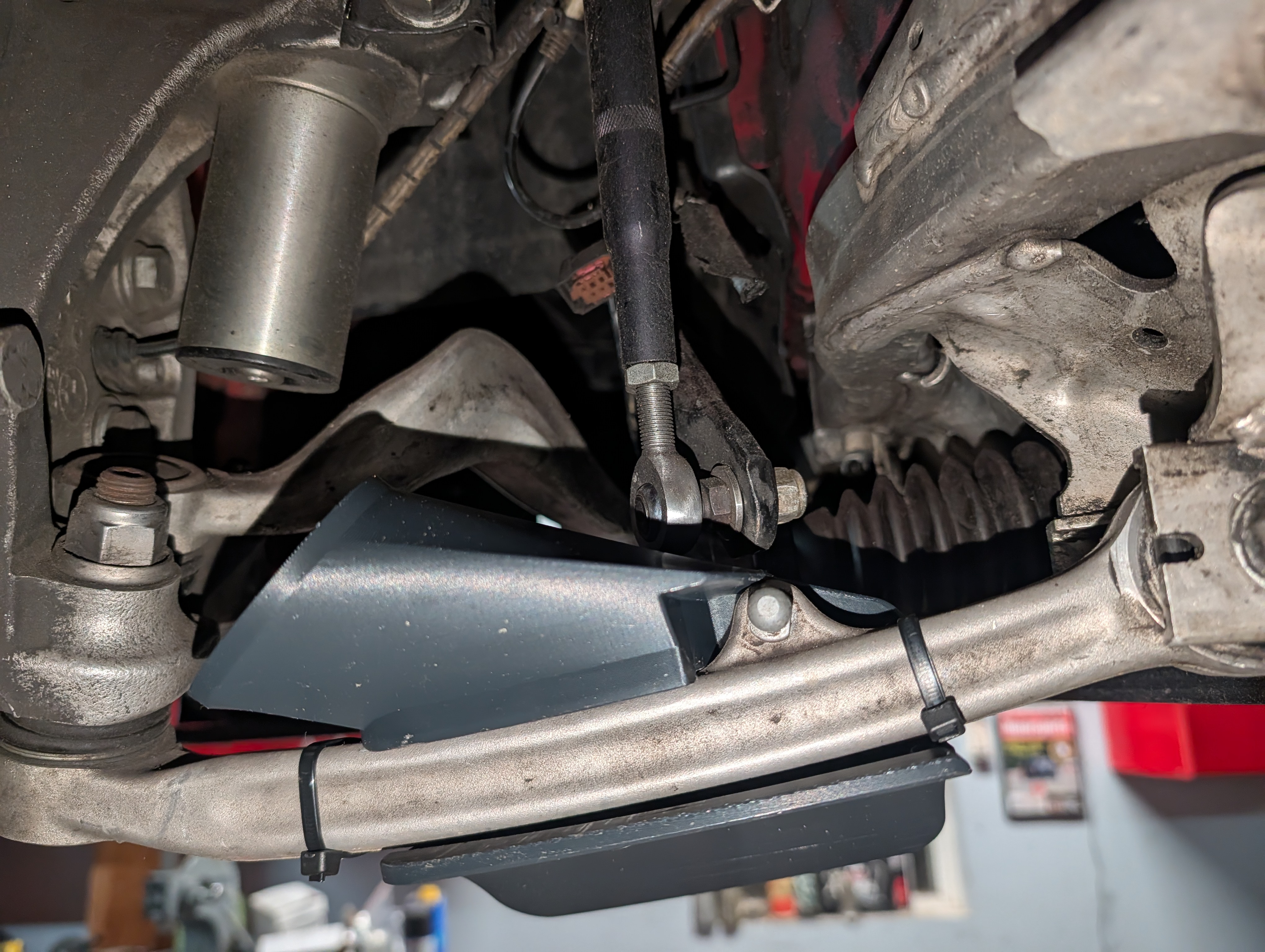 Front arm duct from further under the car
