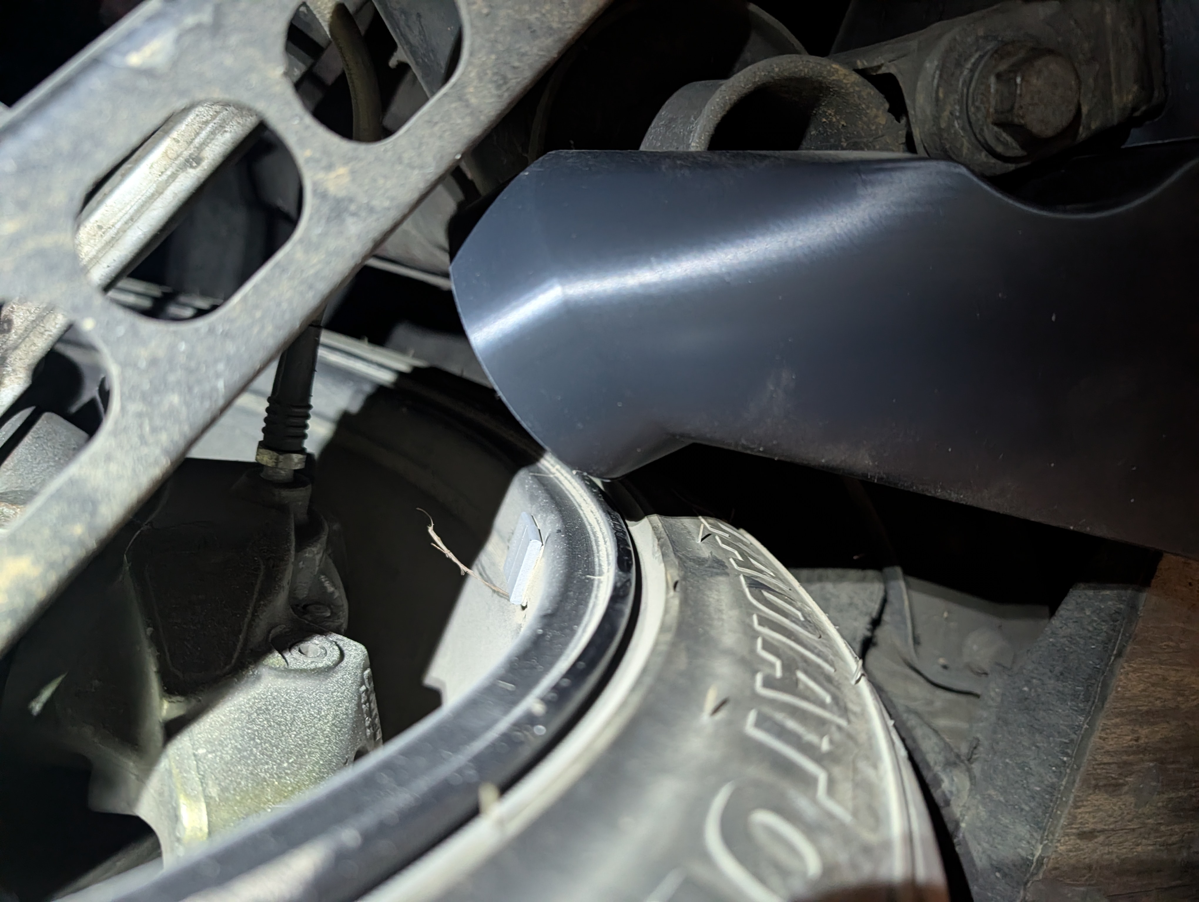 Rear duct body detail around the mounting bolt