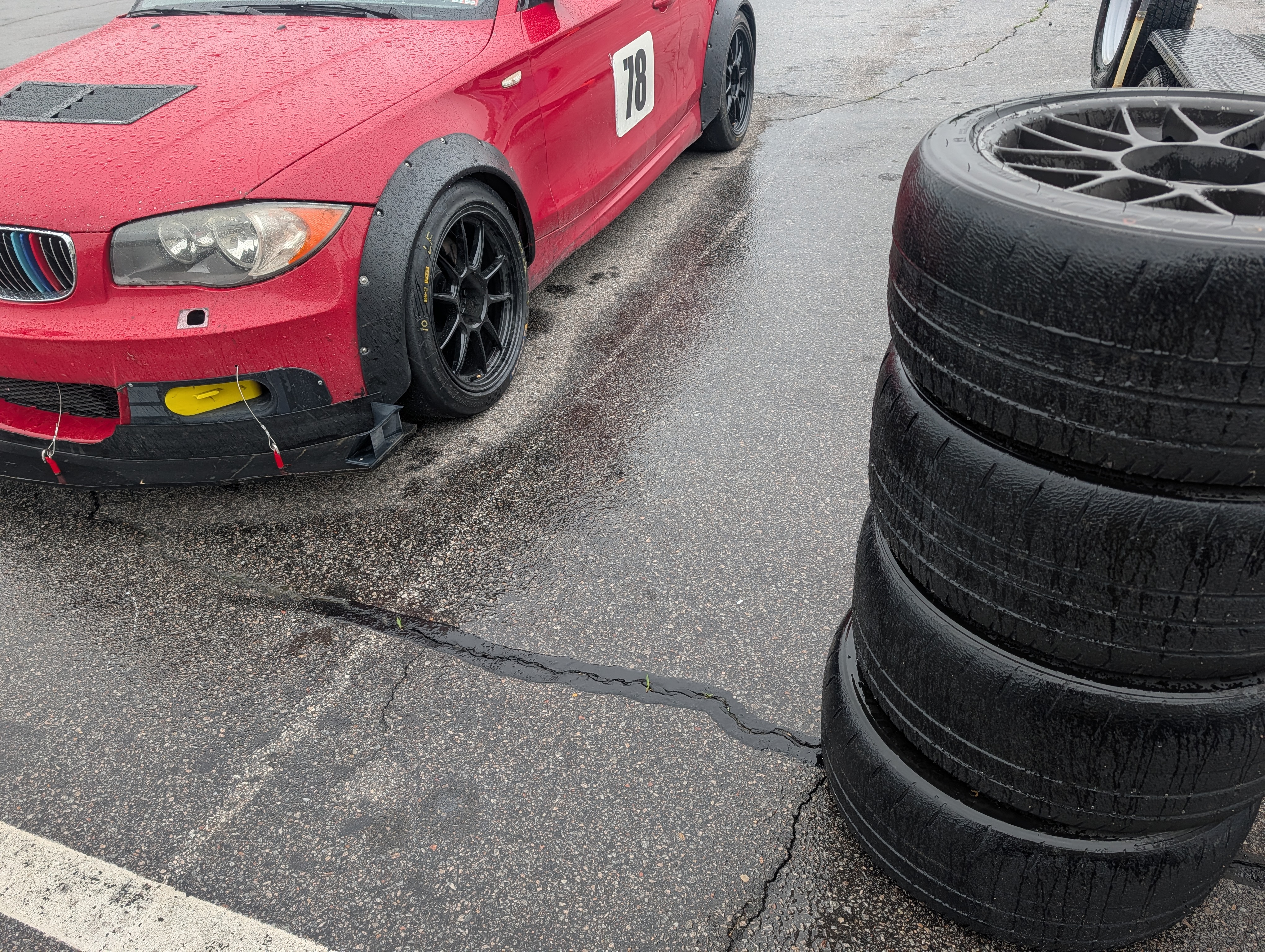 The 135i track car, #78, at a wet track weekend
