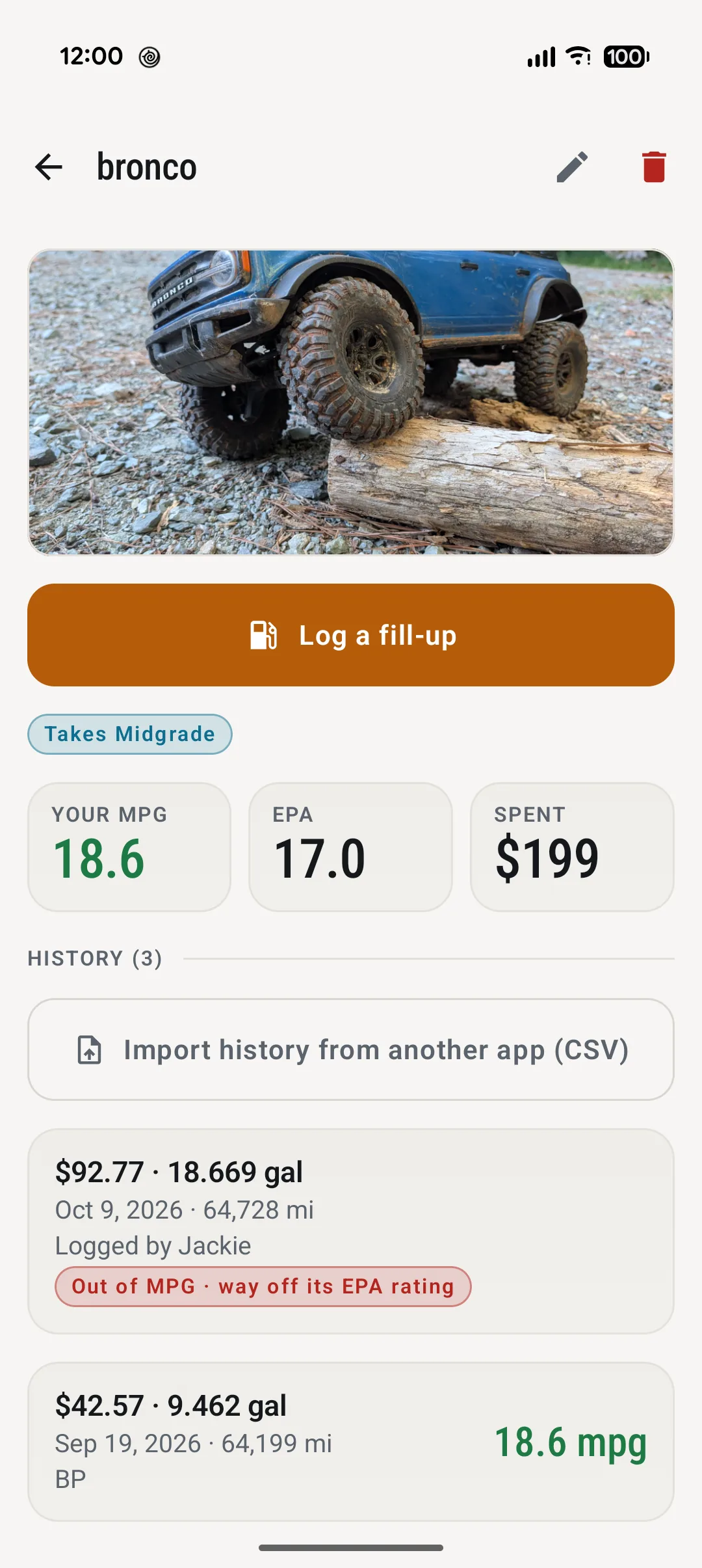 The Bronco's page: its photo on a log in the woods, Log a fill-up, takes midgrade, your MPG 18.6, EPA 17.0, 199 dollars spent, and its history