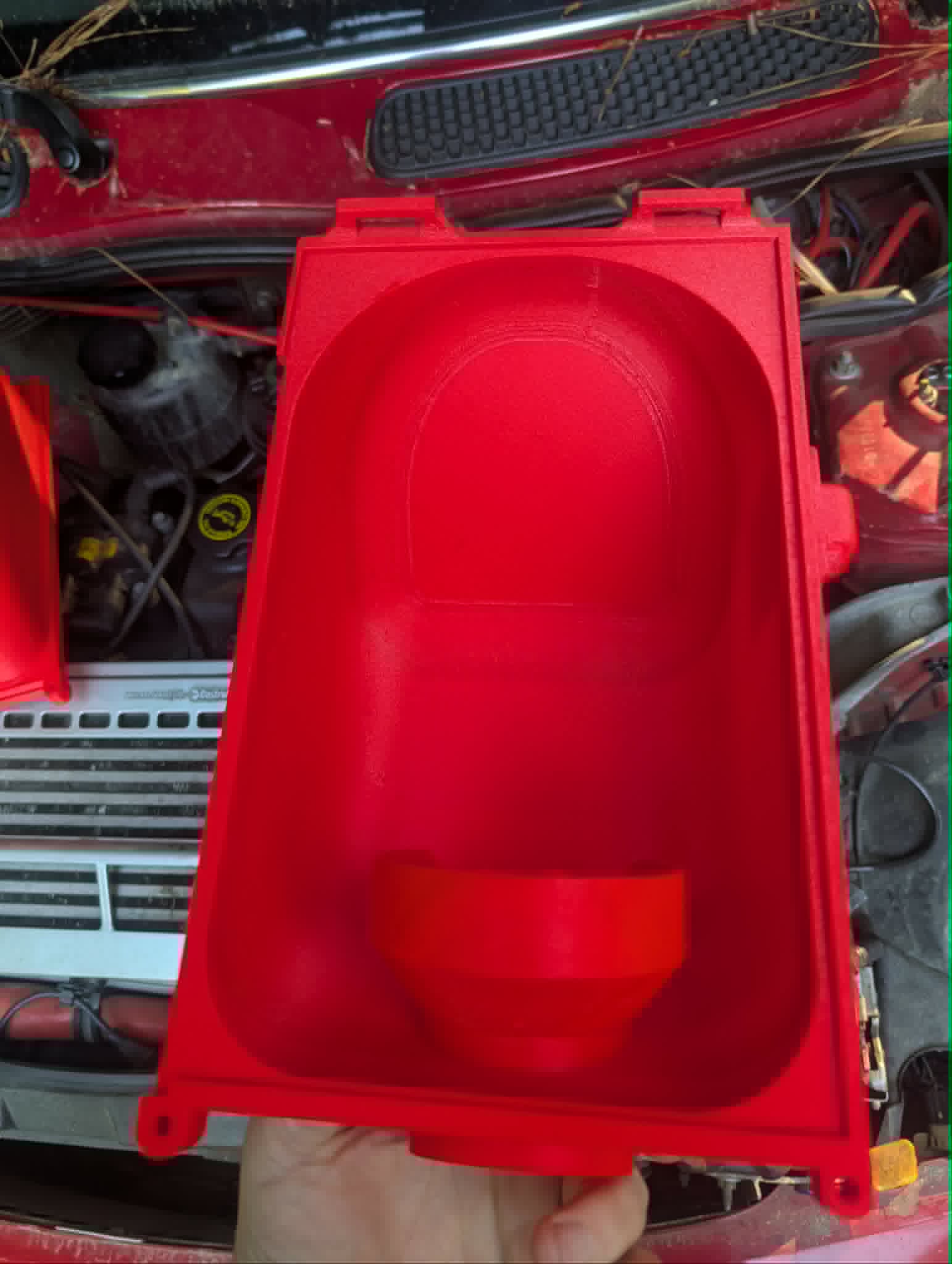 Airbox interior — filter flange and mounting tabs
