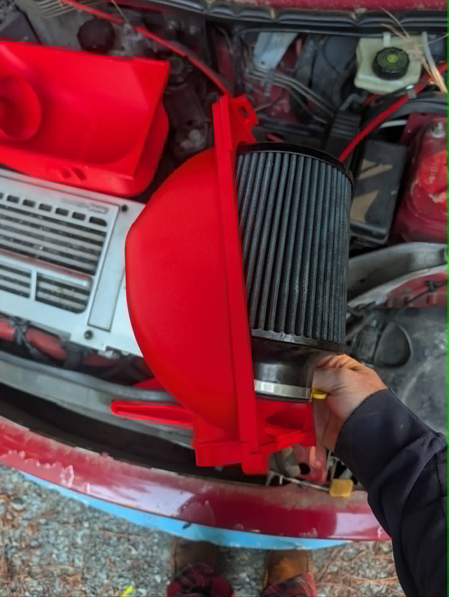 Red airbox with JCW-style filter installed