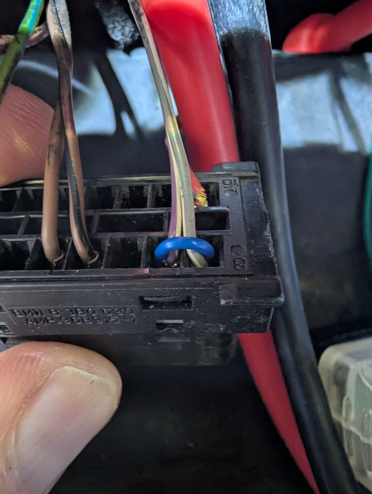 The back of the OBD socket with the blue jumper looped across pins 7 and 8